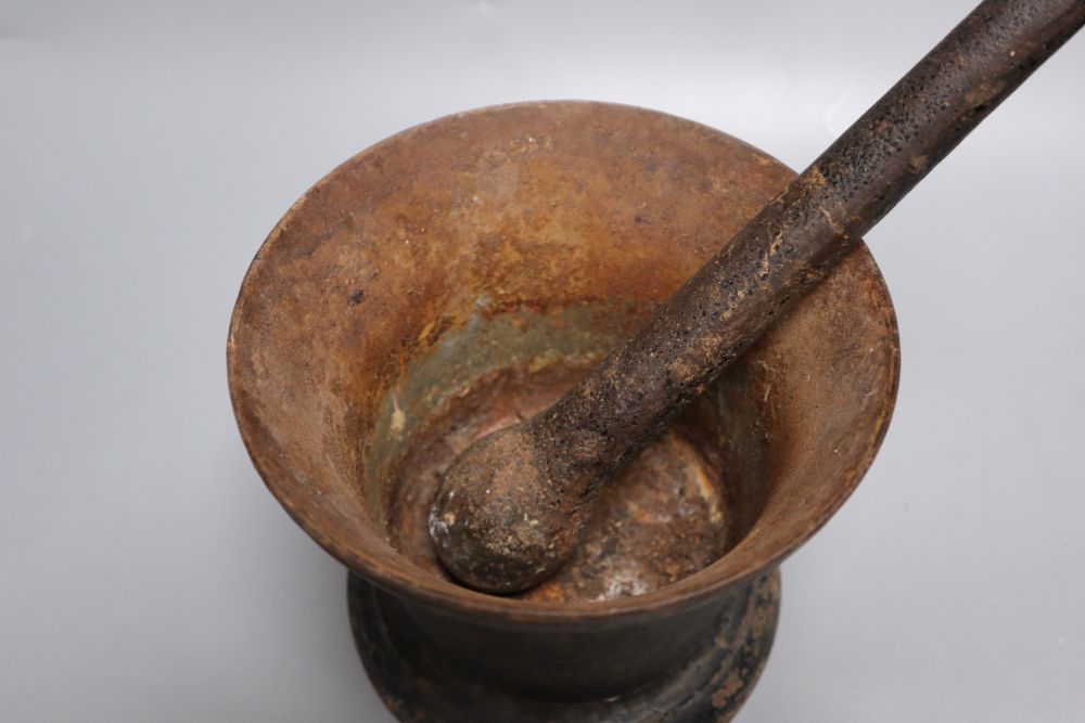 An 18th century iron pestle and mortar, pestle 16cm